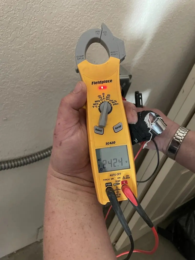 Voltage testing with clamp meter during Ceiling Fan Installation in Morganfield